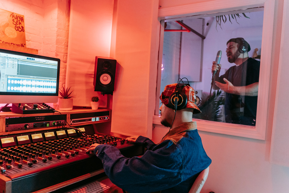 Men Recording in a Music Studio
